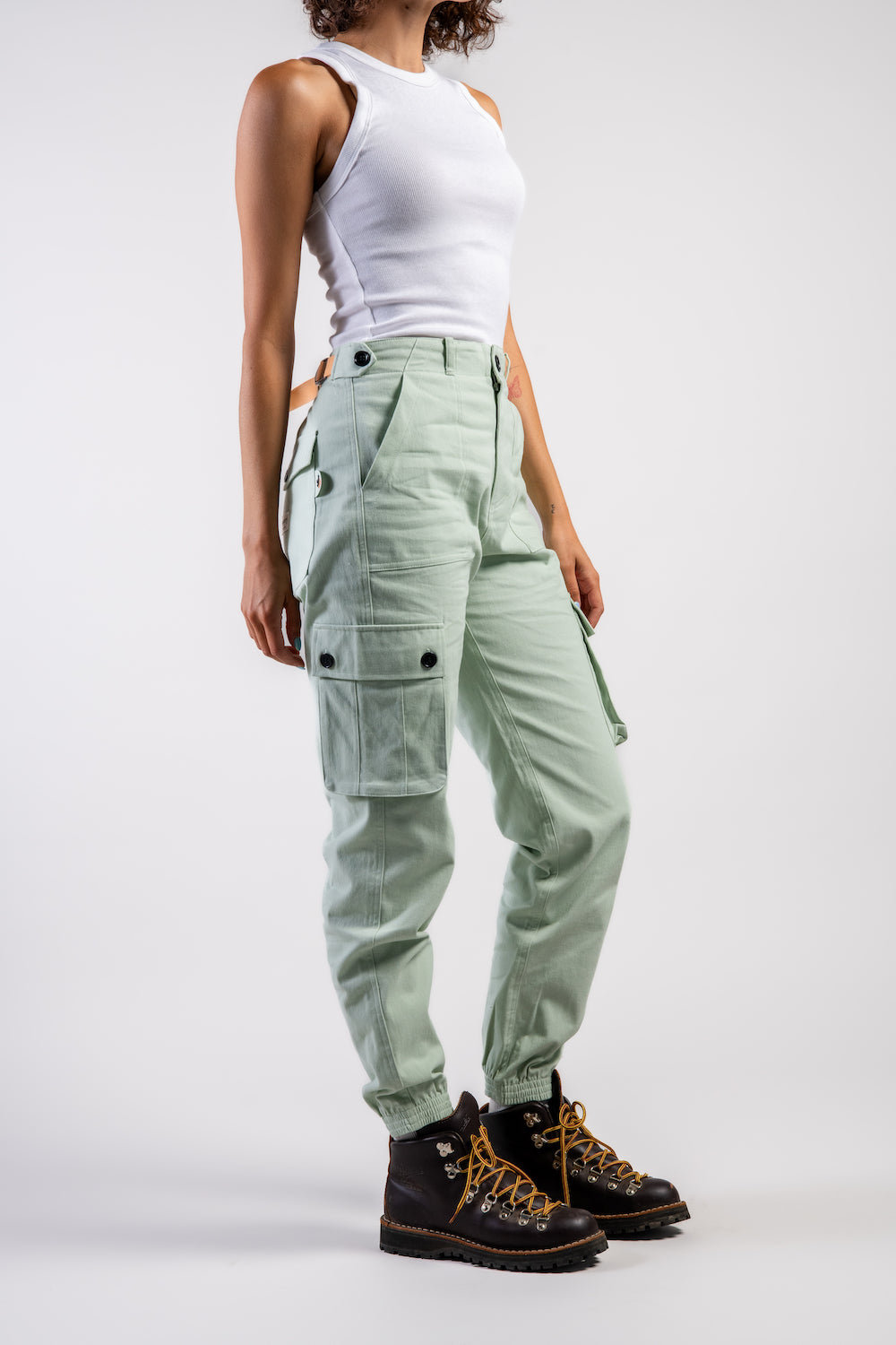 women in outdoor hiking pants and hiking boots #color_agave