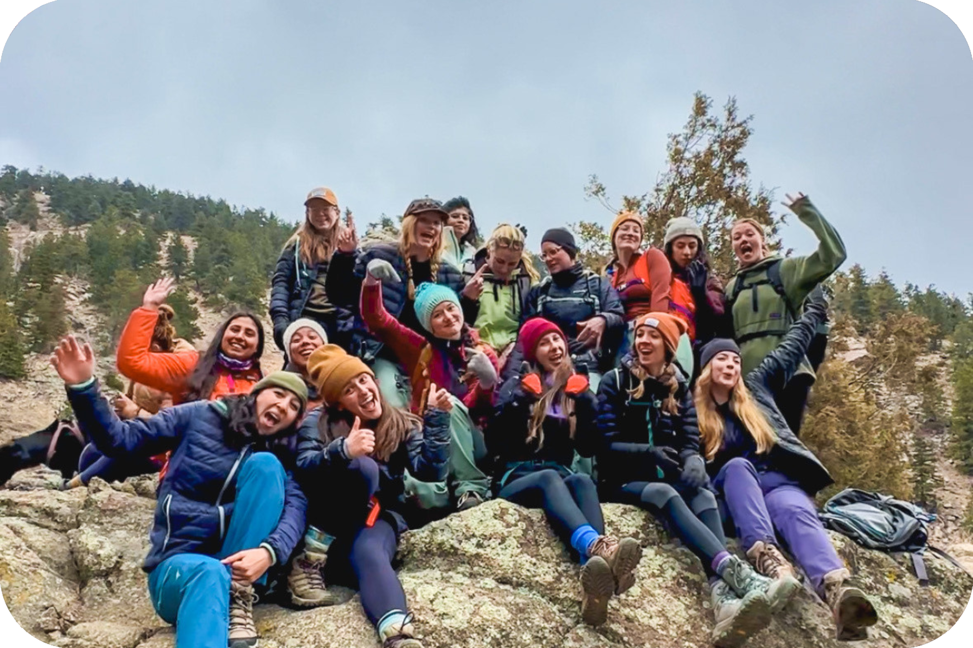 Group of women gathering on a hiking trail