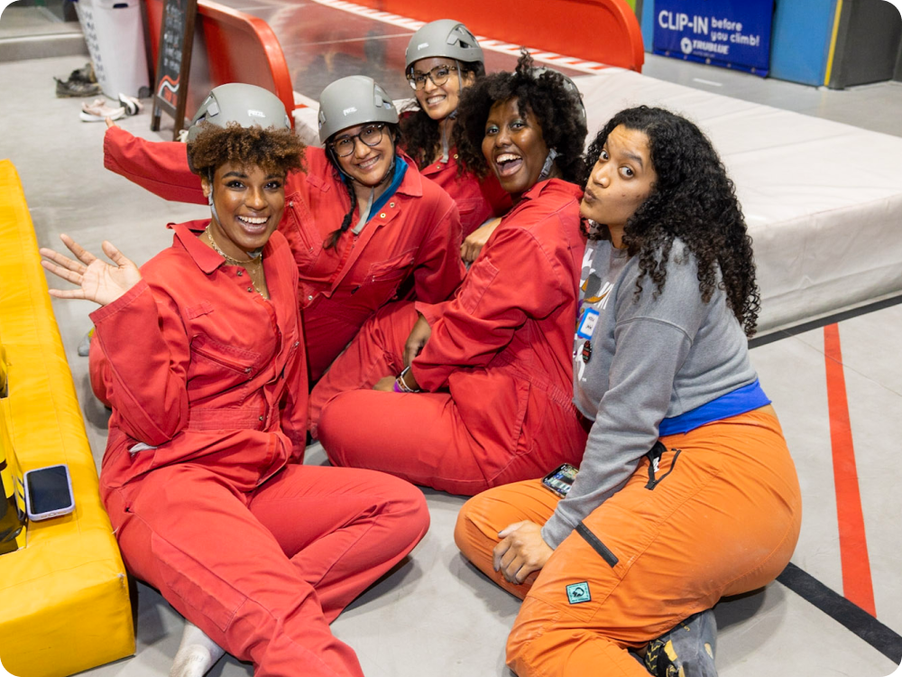 Brown and black women at Free Los Angeles climbing gym event