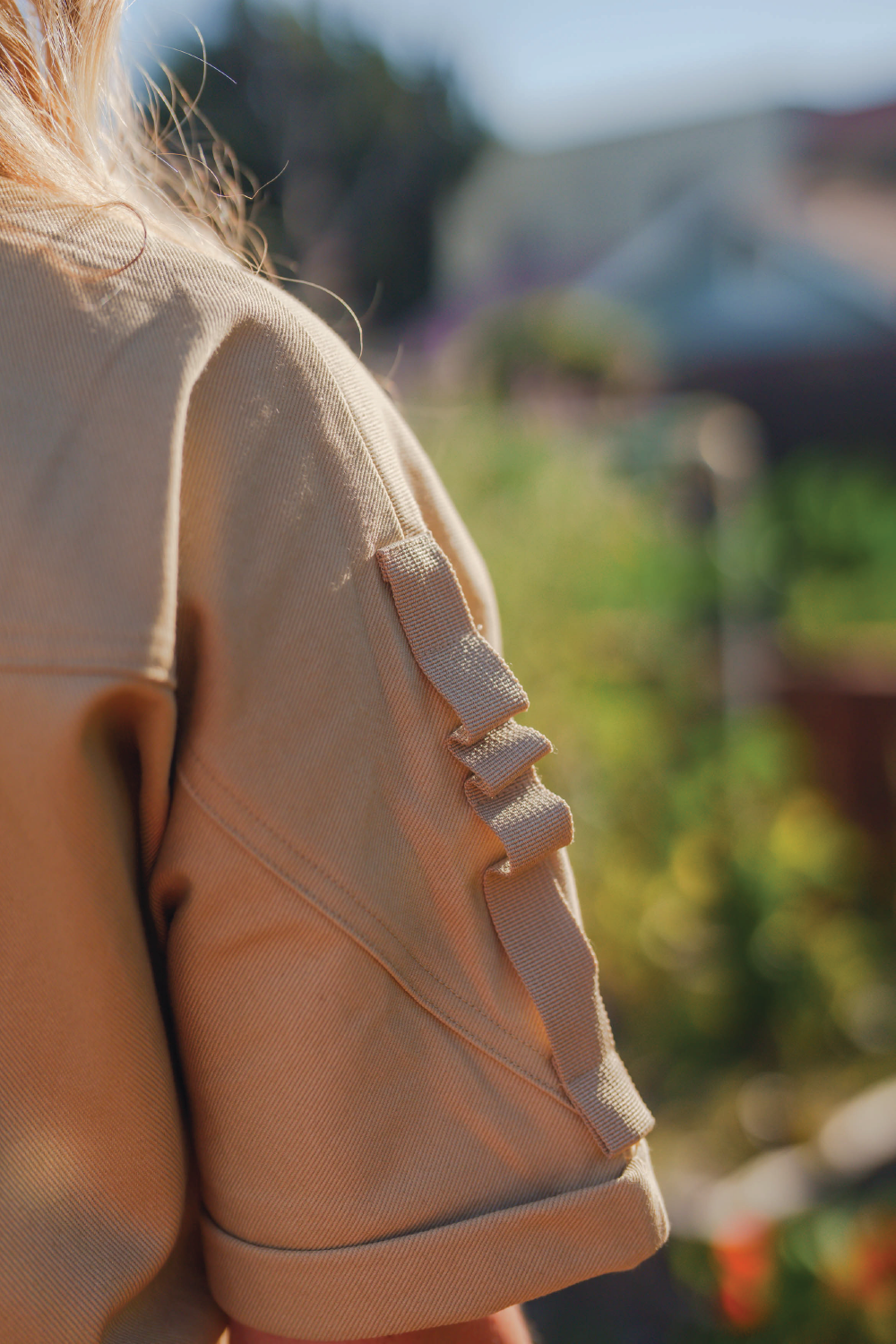 carrier travel loops on women's denim short sleeve khaki jumpsuit