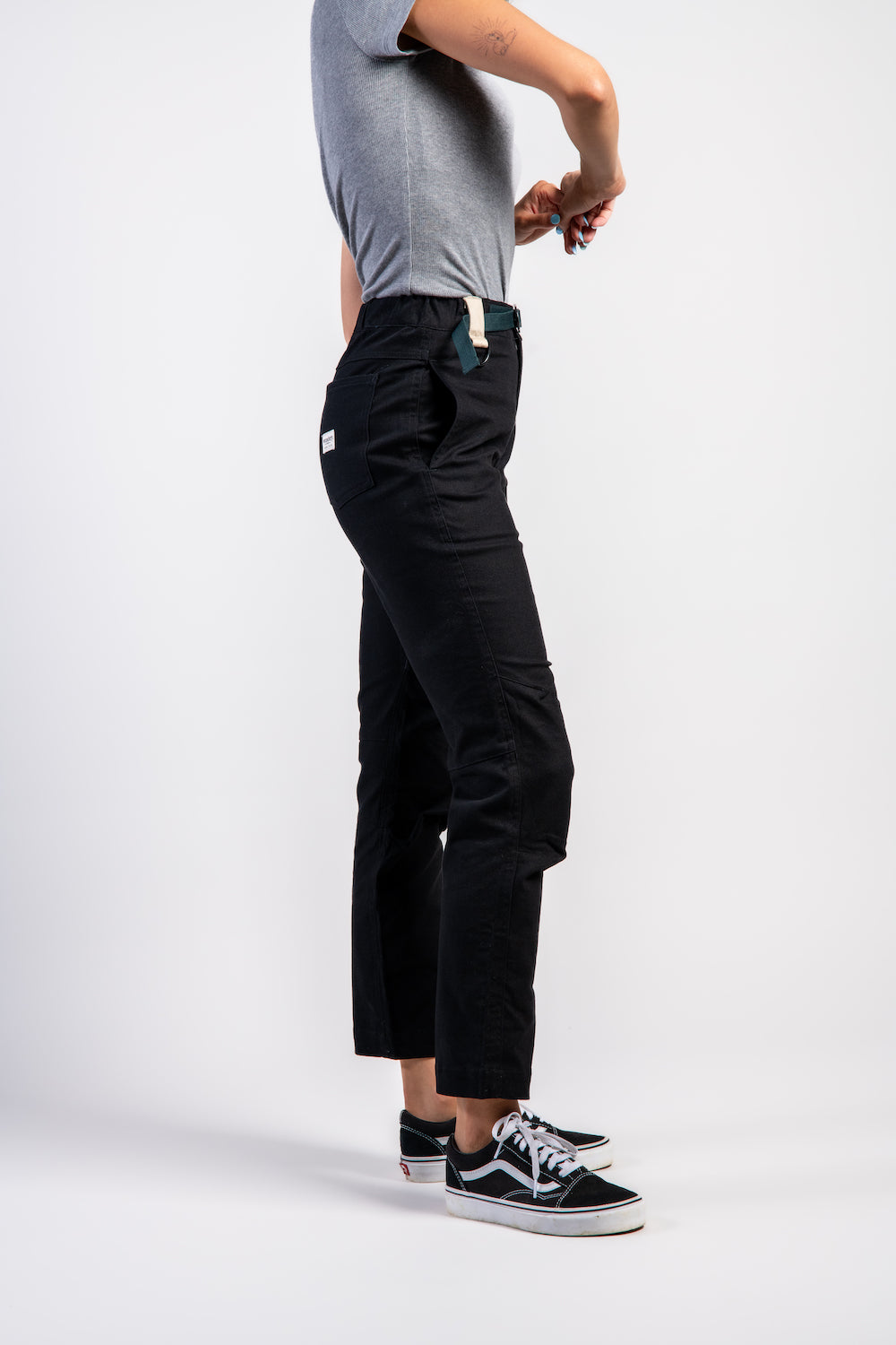 Woman in casual straight leg pants and gray t-shirt top #color_black