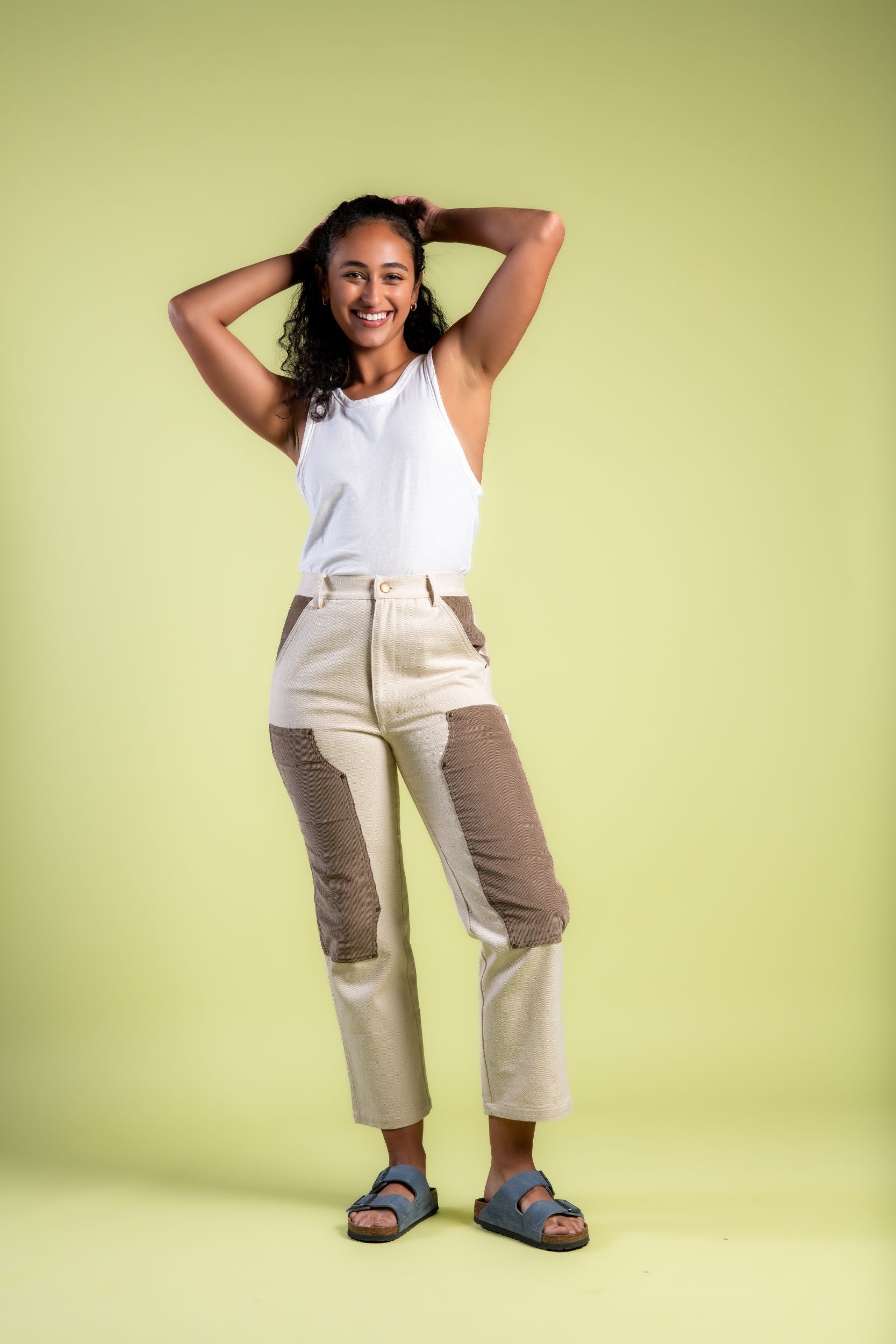 Woman in straight leg patchwork denim pants and Birkenstocks #color_cream