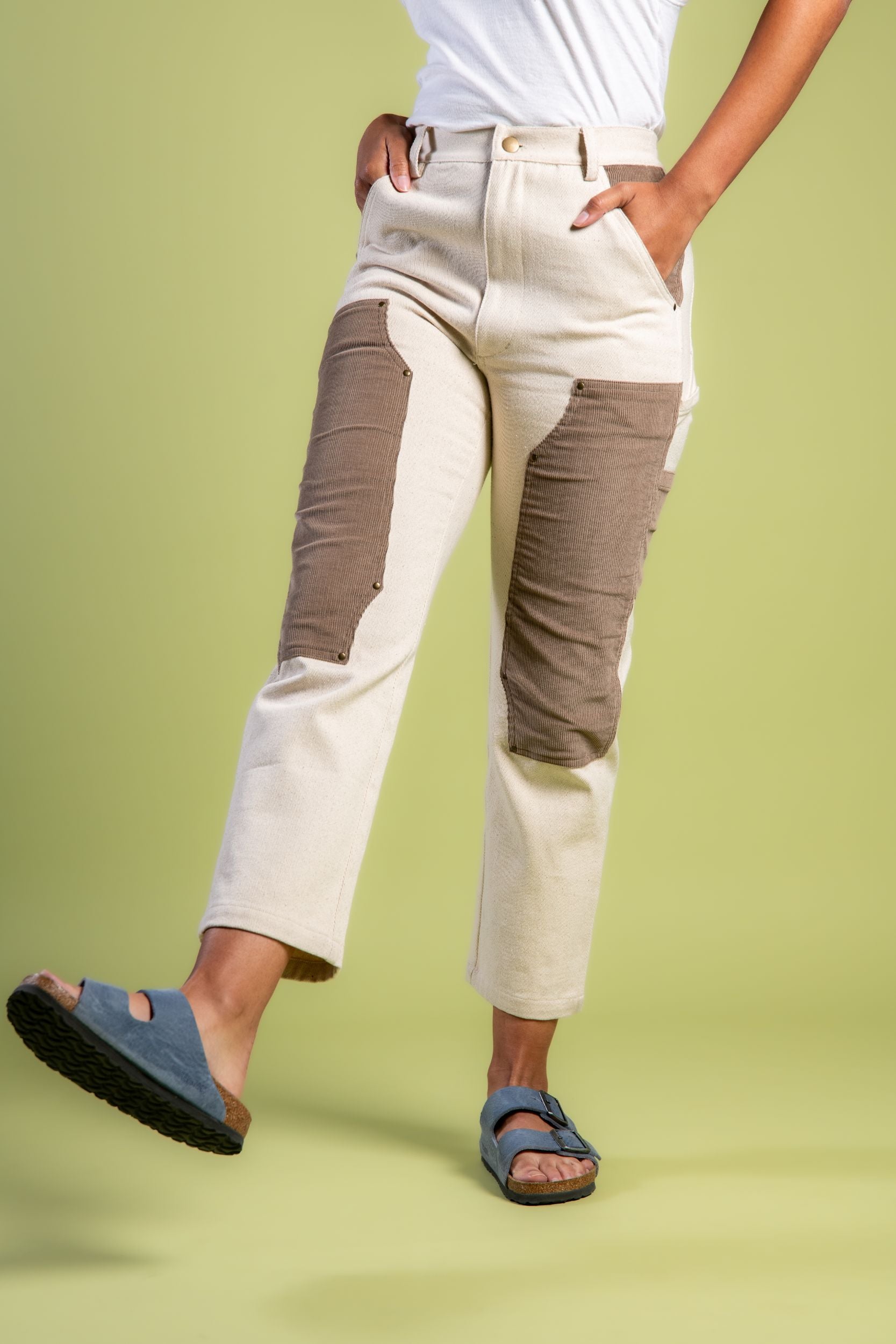 Petite woman in straight leg patchwork denim pants and Birkenstocks #color_cream