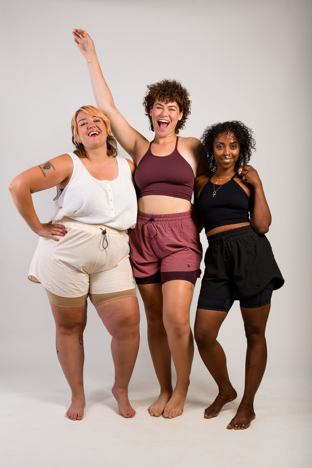 tall plus size and short women in athletic lightweight running shorts and sports bra #color_dusty rose/mauve